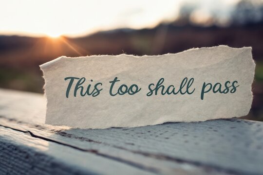 Torn paper with motivational quote in outdoor sunlight - Powered by Adobe