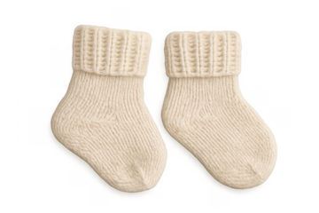 Pair of knitted wool baby socks on transparent background