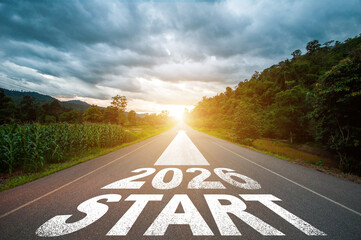 New year 2026 or straight forward concept. Text 2025 written on the road in the middle of asphalt road with at sunset. Concept of planning, goal, challenge, new year resolution.
