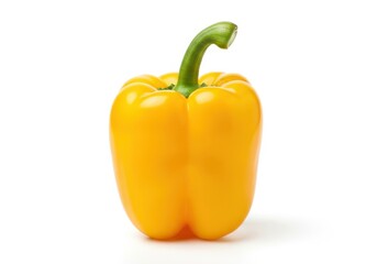 Bright yellow sweet pepper stands upright isolated on a clean white background