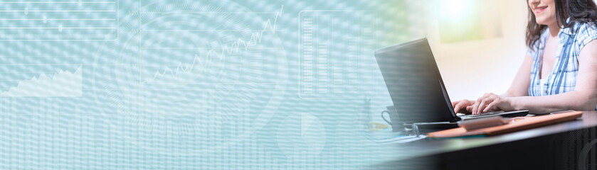 Young attractive businesswoman working on laptop, light effect; panoramic banner