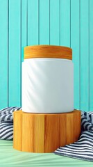 A white jar with a wooden lid sits on a wooden pedestal, draped with a striped cloth, against a teal wooden wall.