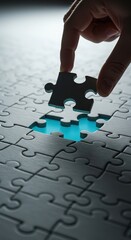 Placing the final connecting piece into a complex jigsaw puzzle array, symbolizing completion, challenge resolution, and successful strategy ,jigsaw ,fitting ,system