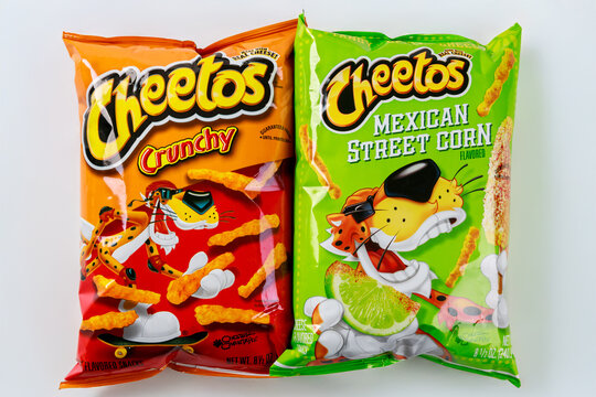 October 25, 2023. Spartanburg, SC USA. Colorful snack bags display two flavors of Cheetos cheese puffs while other highlights Mexican street corn flavor.