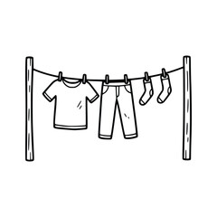 Clothesline with Tshirt Pants and Socks Hanging to Dry.