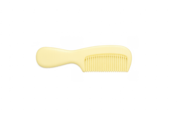 Yellow plastic baby comb for hair care