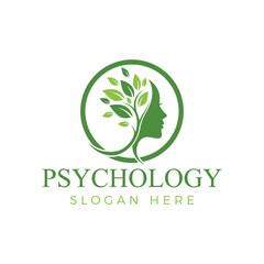 Psychology logo design featuring a green human head silhouette and a tree