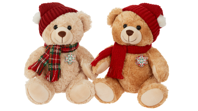 Two adorable teddy bears wearing festive hats and scarves holding hands