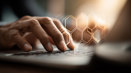 Hands typing on a keyboard with a digital network overlay, conveying cybersecurity, data management, and innovation in modern work.
