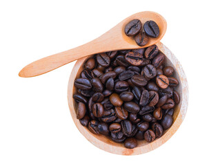 coffee beans in a cup with wooden spoon isolated on white background