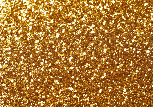 Sparkling gold glitter texture background abstract shimmering particles festive celebration backdrop.