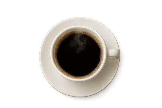 Hot black coffee steaming in white cup with saucer, offering morning energy, top down view, transparent background - Powered by Adobe
