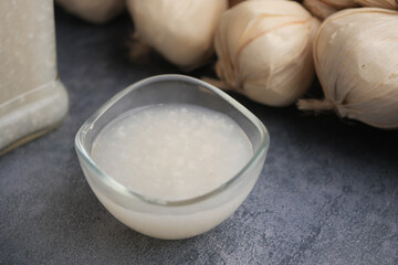 closeup of garlic liquid sauce in a small bowl 