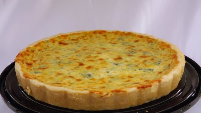 A savory broccoli quiche delight featuring fresh broccoli florets baked into a creamy egg filling creating a wholesome flavorful dish perfect for breakfast brunch or anytime enjoyment