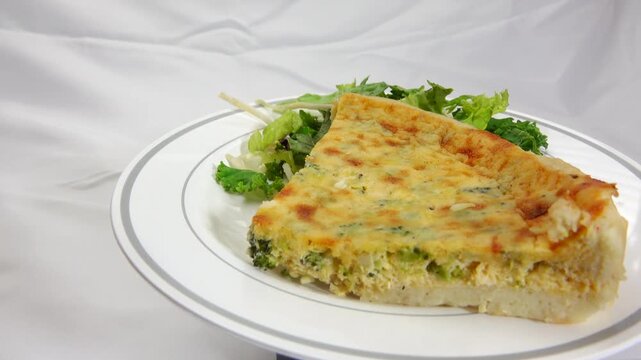 Savory broccoli quiche delight featuring fresh broccoli florets baked into a creamy egg filling creating a wholesome flavorful dish perfect for breakfast brunch or anytime enjoyment