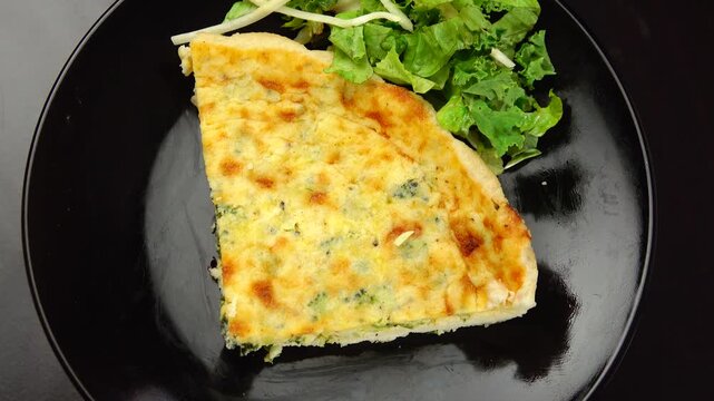 A savory broccoli quiche delight featuring fresh broccoli florets baked into a creamy egg filling creating a wholesome flavorful dish perfect for breakfast brunch or anytime enjoyment