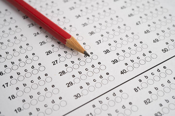 Answer sheets with pencil drawing fill to select choice, education.