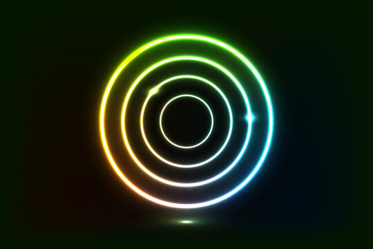Glowing neon rings in a gradient of green, yellow, and blue against a black background. Abstract, futuristic, and vibrant design.