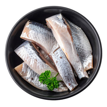 Creamy and savory herring spread, a traditional scandinavian or baltic fish pate, served in a dark bowl and beautifully isolated on white background