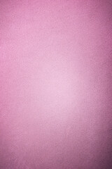 Pink suede background with light center. Natural suede leather pink.
