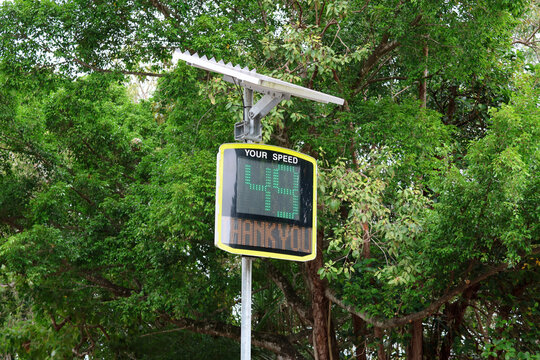 Roadside speed sign radar with a digital screen showing the number 49 and the words Thank You