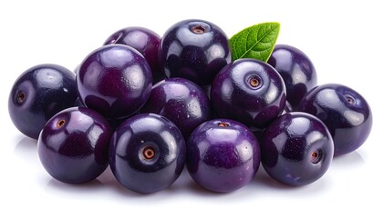 A close-up shot of a small pile of dark purple, round berries, with a single green leaf. The berries look juicy and ripe