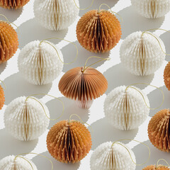 Top view of white beige honeycomb paper Christmas ornaments in minimal trend creative pattern on light background. New Year balls and one fungus with sun shadows, graphic layout modern holiday design.