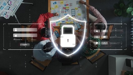 A top-down view of a team collaborating on a cybersecurity project, featuring digital security symbols and brainstorming materials in a modern office space. Raster