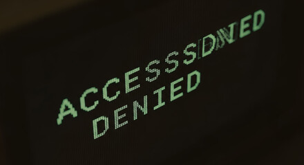 ACCESS DENIED message displayed on a screen, symbolizing a digital barrier, blocked and restricted access