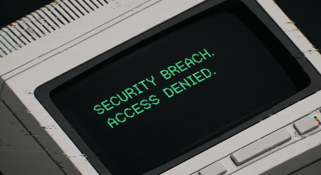 A stark image of a retro computer monitor displaying the urgent message SECURITY BREACH. ACCESS DENIED,. Capturing the tension of data security and cybersecurity threats in the digital age.