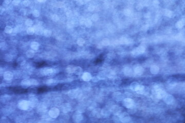 光をぼかした青の背景素材