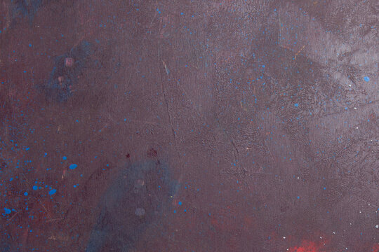 Abstract textured background with a mottled purple and brown color palette suggesting aged metal or weathered stone surfaces