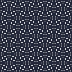 Seamless navy blue polka dot pattern with small white spots © rahayu