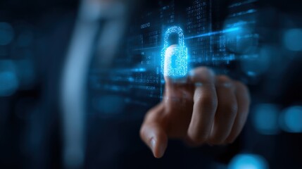 Fototapeta premium A digital lock icon is activated by a person's finger, symbolizing cybersecurity and data protection in a modern technological environment.