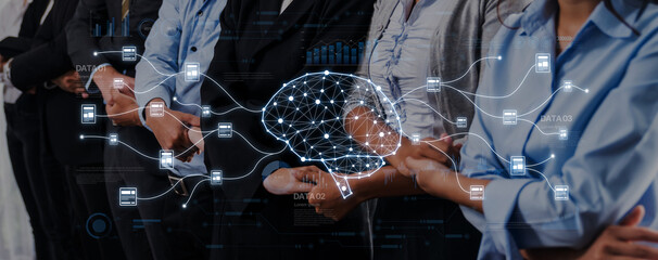 A diverse group of professionals stands together, symbolizing collaboration and innovation, with a digital brain illustration representing advanced technology and data connections. Trope