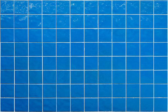 Blue ceramic tile background. Old vintage ceramic tiles in green to decorate the kitchen or bathroom 