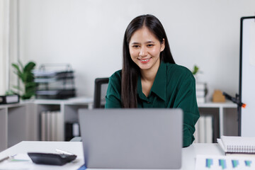 Asian business woman Auditor or internal revenue service staff checking annual financial statements company Audit  Accounting tax
