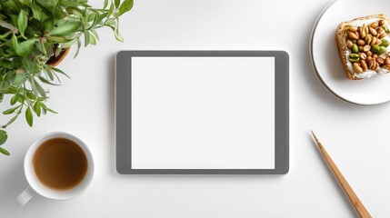 Tablet mockup with coffee and plants for website design