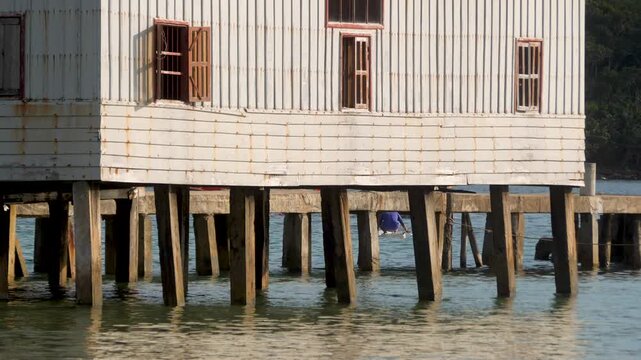 House on stilts over water in Sihanoukville Koh ROng Samloem island in Cambodia