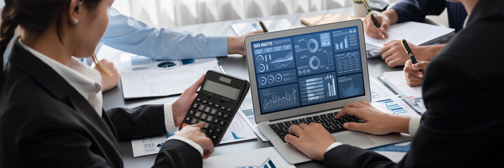 Business intelligence and data analysis concept. Analyst team working on financial data analysis...