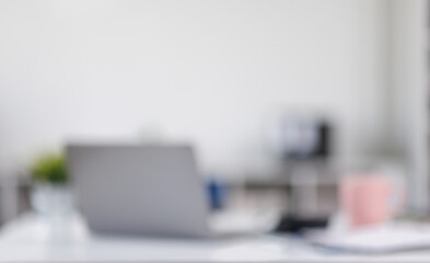 blurred laptop desk background office