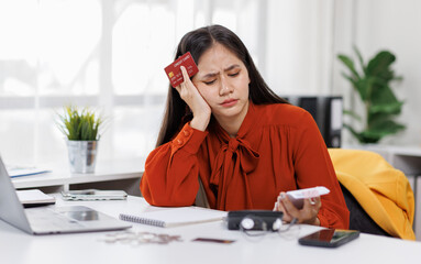 Frustrated desperate millennial woman checking bills for payments, holding receipts, getting upset about overspending, too high mortgage, insurance fees. Homeowner analyzing costs, expenses, budget

