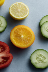 stunning composition featuring variety of colorful fruits and vegetables cut in half displayed on clean bright