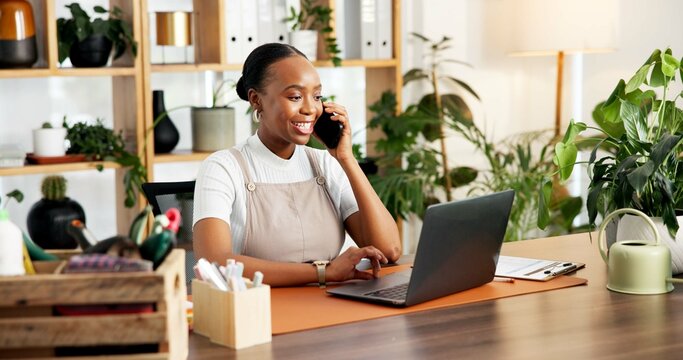 Phone call, smile or black woman in office with laptop, client chat or research on sustainable material. Happy, review or eco consultant in agency with tech, feedback or negotiation on green product.