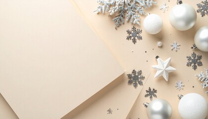 white ornaments and silver snowflakes on beige background with star confetti
