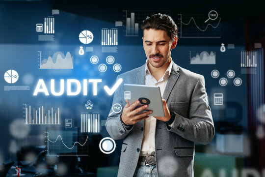 Professional conducting an audit using a tablet in a modern office setting