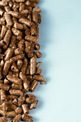 Wood pellets biomass closeup, creating renewable energy for heating homes and promoting environmental sustainability