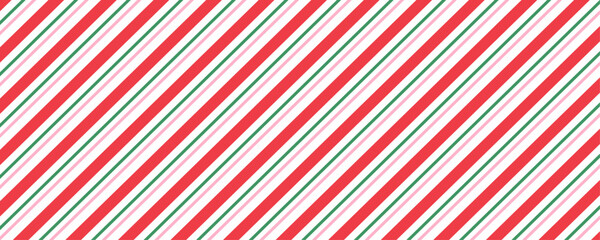 Red and green diagonal stripe seamless pattern. Candy cane christmas seamless pattern background. Vector illustration.