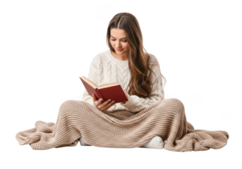 Young woman with long brown hair wearing a cozy sweater reading a book wrapped in a blanket isolated on transparent background