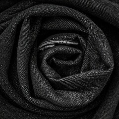 Rolled denim texture creates dark flower shape